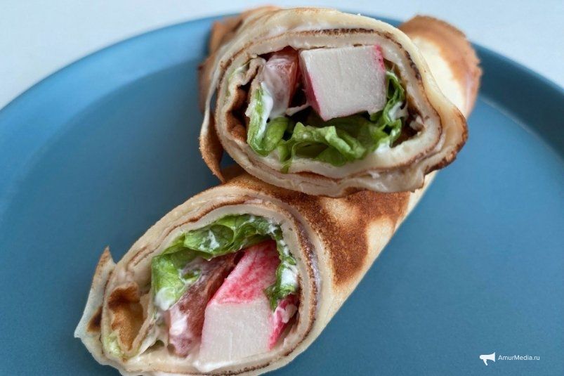 Рулет из блинов с крабовыми палочками — быстрая и аппетитная закуска Рулет из блинов с крабовыми палочками — быстрая и аппетитная закуска